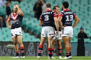 SYDNEY, AUSTRALIA - OCTOBER 09: Jake Friend (2nd R) of the Roosters reacts after losing the NRL Semi Final match between the Sydney Roosters and the Canberra Raiders at the Sydney Cricket Ground on October 09, 2020 in Sydney, Australia. (Photo by Mark Kolbe/Getty Images)