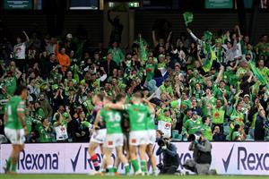 SYDNEY, AUSTRALIA - OCTOBER 09: Raiders fans celebrate after winning the NRL Semi Final match between the Sydney Roosters and the Canberra Raiders at the Sydney Cricket Ground on October 09, 2020 in Sydney, Australia. (Photo by Mark Kolbe/Getty Images)