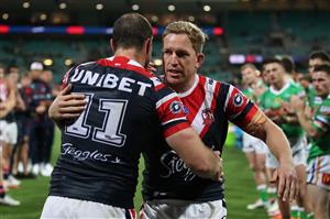 SYDNEY, AUSTRALIA - OCTOBER 09: Boyd Cordner of the Roosters hugs Mitchell Aubusson of the Roosters after playing in his last NRL match after the NRL Semi Final match between the Sydney Roosters and the Canberra Raiders at the Sydney Cricket Ground on October 09, 2020 in Sydney, Australia. (Photo by Cameron Spencer/Getty Images)