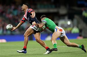SYDNEY, AUSTRALIA - OCTOBER 09: Daniel Tupou of the Roosters offloads the ball during the NRL Semi Final match between the Sydney Roosters and the Canberra Raiders at the Sydney Cricket Ground on October 09, 2020 in Sydney, Australia. (Photo by Cameron Spencer/Getty Images)