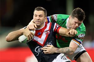 SYDNEY, AUSTRALIA - OCTOBER 09: James Tedesco of the Roosters is tackled by John Bateman of the Raiders during the NRL Semi Final match between the Sydney Roosters and the Canberra Raiders at the Sydney Cricket Ground on October 09, 2020 in Sydney, Australia. (Photo by Cameron Spencer/Getty Images)