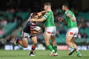 SYDNEY, AUSTRALIA - OCTOBER 09: James Tedesco of the Roosters is tackled during the NRL Semi Final match between the Sydney Roosters and the Canberra Raiders at the Sydney Cricket Ground on October 09, 2020 in Sydney, Australia. (Photo by Cameron Spencer/Getty Images)