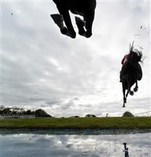 WINCANTON, ENGLAND - OCTOBER 15: A general view as runners clear the water jump in The Use The racingtv.com Tracker Novices' Handicap Chase at Wincanton Racecourse on October 15, 2020 in Wincanton, England. Owners are allowed to attend if they have a runner at the meeting otherwise racing remains behind closed doors to the public due to the Coronavirus pandemic. (Photo by Alan Crowhurst/Getty Images)