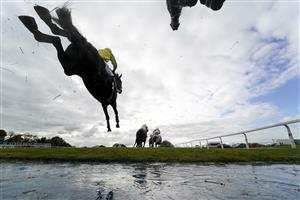 WINCANTON, ENGLAND - OCTOBER 15: A general view as runners clear the water jump in The Use The racingtv.com Tracker Novices' Handicap Chase at Wincanton Racecourse on October 15, 2020 in Wincanton, England. Owners are allowed to attend if they have a runner at the meeting otherwise racing remains behind closed doors to the public due to the Coronavirus pandemic. (Photo by Alan Crowhurst/Getty Images)