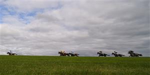 WINCANTON, ENGLAND - OCTOBER 15: A general view as runners race down the back straight in The Join Racing TV Now Maiden Hurdle at Wincanton Racecourse on October 15, 2020 in Wincanton, England. Owners are allowed to attend if they have a runner at the meeting otherwise racing remains behind closed doors to the public due to the Coronavirus pandemic. (Photo by Alan Crowhurst/Getty Images)