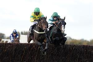 WINCANTON, ENGLAND - OCTOBER 15: Lilly Pinchin riding Follow The Swallow (R) clear the last to win The Over 40 Free RacingTV Club Days Handicap Chase at Wincanton Racecourse on October 15, 2020 in Wincanton, England. Owners are allowed to attend if they have a runner at the meeting otherwise racing remains behind closed doors to the public due to the Coronavirus pandemic. (Photo by Alan Crowhurst/Getty Images)