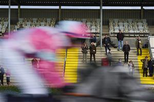 WINCANTON, ENGLAND - OCTOBER 15: Tom O'Brien riding Moon Of Baroda pass the owners grandstand during The Bet At racingtv.com Novices' Hurdle at Wincanton Racecourse on October 15, 2020 in Wincanton, England. Owners are allowed to attend if they have a runner at the meeting otherwise racing remains behind closed doors to the public due to the Coronavirus pandemic. (Photo by Alan Crowhurst/Getty Images)
