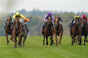 ASCOT, ENGLAND - OCTOBER 17: Tom Marquand riding Addeybb (yellow) win The Qipco Champion Stakes during the Qipco British Champions Day at Ascot Racecourse on October 17, 2020 in Ascot, England. Owners are allowed to attend if they have a runner at the meeting otherwise racing remains behind closed doors to the public due to the Coronavirus pandemic. (Photo by Alan Crowhurst/Getty Images)