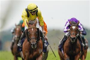 ASCOT, ENGLAND - OCTOBER 17: Tom Marquand riding Addeybb (yellow) win The Qipco Champion Stakes during the Qipco British Champions Day at Ascot Racecourse on October 17, 2020 in Ascot, England. Owners are allowed to attend if they have a runner at the meeting otherwise racing remains behind closed doors to the public due to the Coronavirus pandemic. (Photo by Alan Crowhurst/Getty Images)