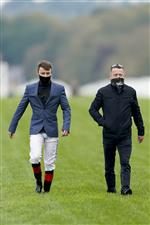 ASCOT, ENGLAND - OCTOBER 17: Father and son, Cieren Fallon (L) and his father Kieren walk the course during the Qipco British Champions Day at Ascot Racecourse on October 17, 2020 in Ascot, England. Owners are allowed to attend if they have a runner at the meeting otherwise racing remains behind closed doors to the public due to the Coronavirus pandemic. (Photo by Alan Crowhurst/Getty Images)