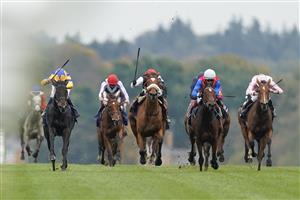 ASCOT, ENGLAND - OCTOBER 17: William Buick riding Wonderful Tonight (L, yellow/blue) win The Qipco British Champions Fillies & Mares Stakes during the Qipco British Champions Day at Ascot Racecourse on October 17, 2020 in Ascot, England. Owners are allowed to attend if they have a runner at the meeting otherwise racing remains behind closed doors to the public due to the Coronavirus pandemic. (Photo by Alan Crowhurst/Getty Images)