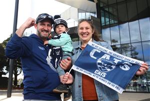 GEELONG, AUSTRALIA - OCTOBER 21: Tim and Sara Trenery and their son Thatcher are seen at GMHBA Satdium on October 21, 2020 in Geelong, Australia. The Geelong Cats take on Richmond Tigers in the AFL Grand Final on Saturday 24 October at the Gabba in Brisbane. It is the first time the AFL Grand Final has been played outside of the MCG due to COVID-19 restrictions.. Coronavirus restrictions eased further in Victoria as of 11:59 on Sunday 18 October, with regional Victoria's Third Step restrictions lifted slightly to allow up to two visitors at home and increased limits on numbers at cafes and restaurants. Metropolitan Melbourne is under Second Step restrictions, with residents are now able to travel up to 25km from their homes, and no limits on the time people spend outside their homes exercising. People must continue to stay at home unless for the four permitted reasons – to shop for food and other necessary goods; for care or compassionate reasons; for work or education; for exercise or social interaction, and from Monday, people can also now go to the hairdresser. Up to 10 people from two households can also now meet outdoors, while tennis, golf, bocce and skate parks are now able to open. (Photo by Robert Cianflone/Getty Images)