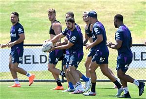 SUNSHINE COAST, AUSTRALIA - OCTOBER 21: Brandon Smith passes the ball during a Melbourne Storm NRL training session at Sunshine Coast Stadium on October 21, 2020 in Sunshine Coast, Australia. (Photo by Bradley Kanaris/Getty Images)