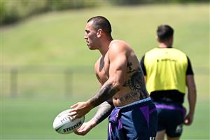 SUNSHINE COAST, AUSTRALIA - OCTOBER 21: Nelson Asofa-Solomona passes the ball during a Melbourne Storm NRL training session at Sunshine Coast Stadium on October 21, 2020 in Sunshine Coast, Australia. (Photo by Bradley Kanaris/Getty Images)
