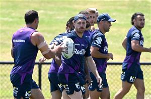 SUNSHINE COAST, AUSTRALIA - OCTOBER 21: Cameron Munster passes the ball during a Melbourne Storm NRL training session at Sunshine Coast Stadium on October 21, 2020 in Sunshine Coast, Australia. (Photo by Bradley Kanaris/Getty Images)