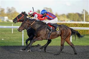 SUNBURY, ENGLAND - OCTOBER 20: Rob Hornby riding Autumn Trail (nearest) win The Unibet Thanks The Frontline Workers Handicap at Kempton Park Racecourse on October 20, 2020 in Sunbury, England. Owners are allowed to attend if they have a runner at the meeting otherwise racing remains behind closed doors to the public due to the Coronavirus pandemic. (Photo by Alan Crowhurst/Getty Images)