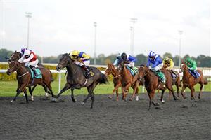 SUNBURY, ENGLAND - OCTOBER 20: Edward Greatrex riding Popmaster (blue/yellow) win The Unibet/British Stallion Studs EBF Novice Stakes at Kempton Park Racecourse on October 20, 2020 in Sunbury, England. Owners are allowed to attend if they have a runner at the meeting otherwise racing remains behind closed doors to the public due to the Coronavirus pandemic. (Photo by Alan Crowhurst/Getty Images)