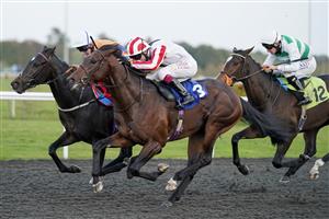SUNBURY, ENGLAND - OCTOBER 20: Oisin Murphy riding Arcadian Nights (white) win The Unibet Casino Deposit 10 Get 40 Bonus Nursery at Kempton Park Racecourse on October 20, 2020 in Sunbury, England. Owners are allowed to attend if they have a runner at the meeting otherwise racing remains behind closed doors to the public due to the Coronavirus pandemic. (Photo by Alan Crowhurst/Getty Images)