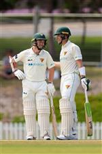 ADELAIDE, AUSTRALIA - OCTOBER 21: (L-R) Jake Doran of the Tasmanian Tigers is congratulated by Tim Paine of the Tasmanian Tigers during day three of the Sheffield Shield match between South Australia and Tasmania at Karen Rolton Oval on October 21, 2020 in Adelaide, Australia. (Photo by Daniel Kalisz/Getty Images)