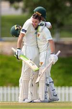 ADELAIDE, AUSTRALIA - OCTOBER 21: (L-R) Tim Paine of the Tasmanian Tigers congratulates Jake Doran of the Tasmanian Tigers celebrates after reaching his century during day three of the Sheffield Shield match between South Australia and Tasmania at Karen Rolton Oval on October 21, 2020 in Adelaide, Australia. (Photo by Daniel Kalisz/Getty Images)