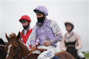 NEWMARKET, ENGLAND - OCTOBER 21: Adam Kirby on board Oman reacts after the British EBF Future Stayers Nursery Handicap at Newmarket Racecourse on October 21, 2020 in Newmarket, England. (Photo by Tim Goode-Pool/Getty Images)