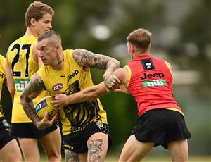 GOLD COAST, AUSTRALIA - OCTOBER 22: Dustin Martin of the Tigers is tackled by Jake Aarts of the Tigers during a Richmond Tigers AFL training session at Metricon Stadium on October 22, 2020 in Gold Coast, Australia. (Photo by Quinn Rooney/Getty Images)
