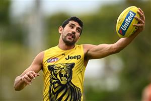 GOLD COAST, AUSTRALIA - OCTOBER 22: Marlion Pickett of the Tigers marks during a Richmond Tigers AFL training session at Metricon Stadium on October 22, 2020 in Gold Coast, Australia. (Photo by Quinn Rooney/Getty Images)