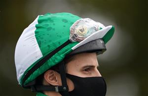 NEWMARKET, ENGLAND - OCTOBER 21: Jockey William Buick with rain covers on his goggles before the Download The MansionBet App Novice Stakes at Newmarket Racecourse on October 21, 2020 in Newmarket, England. (Photo by Tim Goode - Pool/Getty Images)