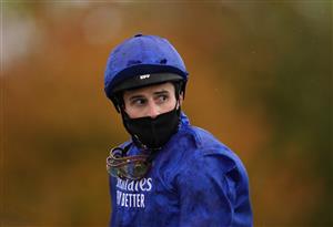 NEWMARKET, ENGLAND - OCTOBER 21: William Buick on board Act Of Wisdom reacts after winning the British EBF Future Stayers Nursery Handicap at Newmarket Racecourse on October 21, 2020 in Newmarket, England. (Photo by Tim Goode-Pool/Getty Images)