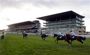 CHELTENHAM, ENGLAND - OCTOBER 23: Runners and riders pass the empty stands during the (Old) Two Farmers Crisps Novices' Chase (GBB Race) at Cheltenham Racecourse on October 23, 2020 in Cheltenham, England. (Photo by David Davies - Pool / Getty Images)