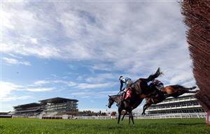 CHELTENHAM, ENGLAND - OCTOBER 23: Galvin ridden by jockey Robbie Power (eventual winner background) and Mossy Fen with jockey Sam Twiston-Davies clear a fence during the (Old) Matchbook Better Way To Bet Novices' Chase (GBB Race) at Cheltenham Racecourse on October 23, 2020 in Cheltenham, England. (Photo by David Davies - Pool / Getty Images)