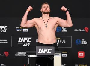 ABU DHABI, UNITED ARAB EMIRATES - OCTOBER 23: In this handout image provided by UFC, Alexander Volkov of Russia poses on the scale during the UFC 254 weigh-in on October 23, 2020 on UFC Fight Island, Abu Dhabi, United Arab Emirates. (Photo by Josh Hedges/Zuffa LLC via Getty Images)