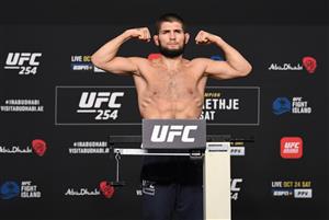 ABU DHABI, UNITED ARAB EMIRATES - OCTOBER 23: In this handout image provided by UFC, Khabib Nurmagomedov of Russia poses on the scale during the UFC 254 weigh-in on October 23, 2020 on UFC Fight Island, Abu Dhabi, United Arab Emirates. (Photo by Josh Hedges/Zuffa LLC via Getty Images)