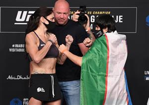 ABU DHABI, UNITED ARAB EMIRATES - OCTOBER 23: In this handout image provided by UFC, (L-R) Opponents Lauren Murphy and Liliya Shakirova of Uzbekistan face off during the UFC 254 weigh-in on October 23, 2020 on UFC Fight Island, Abu Dhabi, United Arab Emirates. (Photo by Josh Hedges/Zuffa LLC via Getty Images)