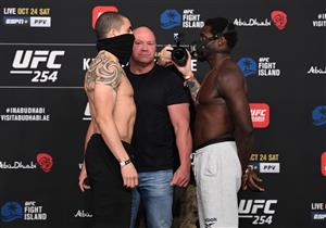 ABU DHABI, UNITED ARAB EMIRATES - OCTOBER 23: In this handout image provided by UFC, (L-R) Opponents Robert Whittaker of Australia and Jared Cannonier face off during the UFC 254 weigh-in on October 23, 2020 on UFC Fight Island, Abu Dhabi, United Arab Emirates. (Photo by Josh Hedges/Zuffa LLC via Getty Images)