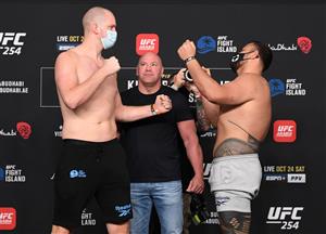 ABU DHABI, UNITED ARAB EMIRATES - OCTOBER 23: In this handout image provided by UFC, (L-R) Opponents Stefan Struve of the Netherlands and Tai Tuisvasa of Australia face off during the UFC 254 weigh-in on October 23, 2020 on UFC Fight Island, Abu Dhabi, United Arab Emirates. (Photo by Josh Hedges/Zuffa LLC via Getty Images)