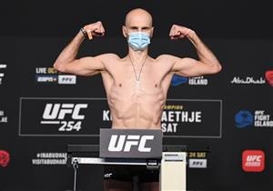 ABU DHABI, UNITED ARAB EMIRATES - OCTOBER 23: In this handout image provided by UFC, Alexander Yakovlev of Russia poses on the scale during the UFC 254 weigh-in on October 23, 2020 on UFC Fight Island, Abu Dhabi, United Arab Emirates. (Photo by Josh Hedges/Zuffa LLC via Getty Images)
