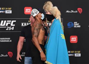 ABU DHABI, UNITED ARAB EMIRATES - OCTOBER 23: In this handout image provided by UFC, (L-R) Opponents Alex Oliveira of Brazil and Shavkat Rakhmonov of Uzbekistan face off during the UFC 254 weigh-in on October 23, 2020 on UFC Fight Island, Abu Dhabi, United Arab Emirates. (Photo by Josh Hedges/Zuffa LLC via Getty Images)