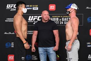 ABU DHABI, UNITED ARAB EMIRATES - OCTOBER 23: In this handout image provided by UFC, (L-R) Opponents Da-Un Jung of South Korea and Sam Alvey face off during the UFC 254 weigh-in on October 23, 2020 on UFC Fight Island, Abu Dhabi, United Arab Emirates. (Photo by Josh Hedges/Zuffa LLC via Getty Images)
