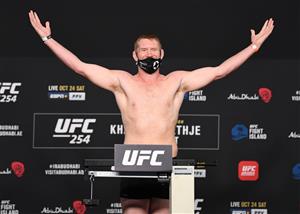 ABU DHABI, UNITED ARAB EMIRATES - OCTOBER 23: In this handout image provided by UFC, Sam Alvey poses on the scale during the UFC 254 weigh-in on October 23, 2020 on UFC Fight Island, Abu Dhabi, United Arab Emirates. (Photo by Josh Hedges/Zuffa LLC via Getty Images)