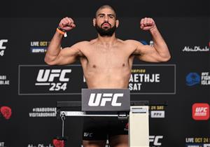 ABU DHABI, UNITED ARAB EMIRATES - OCTOBER 23: In this handout image provided by UFC, Jacob Malkoun of Australia poses on the scale during the UFC 254 weigh-in on October 23, 2020 on UFC Fight Island, Abu Dhabi, United Arab Emirates. (Photo by Josh Hedges/Zuffa LLC via Getty Images)
