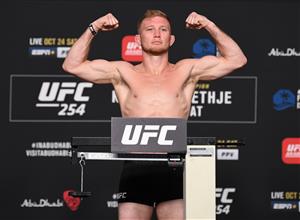 ABU DHABI, UNITED ARAB EMIRATES - OCTOBER 23: In this handout image provided by UFC, Casey Kenney poses on the scale during the UFC 254 weigh-in on October 23, 2020 on UFC Fight Island, Abu Dhabi, United Arab Emirates. (Photo by Josh Hedges/Zuffa LLC via Getty Images)