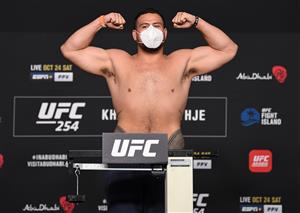 ABU DHABI, UNITED ARAB EMIRATES - OCTOBER 23: In this handout image provided by UFC, Tai Tuisvasa of Australia poses on the scale during the UFC 254 weigh-in on October 23, 2020 on UFC Fight Island, Abu Dhabi, United Arab Emirates. (Photo by Josh Hedges/Zuffa LLC via Getty Images)