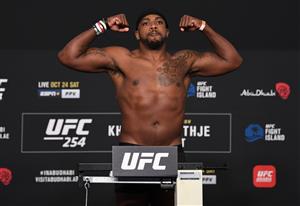 ABU DHABI, UNITED ARAB EMIRATES - OCTOBER 23: In this handout image provided by UFC, Walt Harris poses on the scale during the UFC 254 weigh-in on October 23, 2020 on UFC Fight Island, Abu Dhabi, United Arab Emirates. (Photo by Josh Hedges/Zuffa LLC via Getty Images)