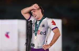SYDNEY, AUSTRALIA - OCTOBER 25: Ryan Papenhuyzen of the Storm is presented with the Clive Churchill Medal during the 2020 NRL Grand Final match between the Penrith Panthers and the Melbourne Storm at ANZ Stadium on October 25, 2020 in Sydney, Australia. (Photo by Mark Kolbe/Getty Images)