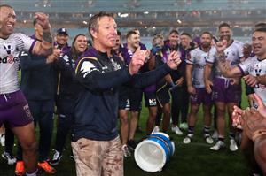 SYDNEY, AUSTRALIA - OCTOBER 25: Storm coach Craig Bellamy has Gatorade poured over him after winning the 2020 NRL Grand Final match between the Penrith Panthers and the Melbourne Storm at ANZ Stadium on October 25, 2020 in Sydney, Australia. (Photo by Cameron Spencer/Getty Images)