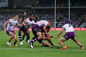 SYDNEY, AUSTRALIA - OCTOBER 25: Stephen Crichton of the Panthers is tackled during the 2020 NRL Grand Final match between the Penrith Panthers and the Melbourne Storm at ANZ Stadium on October 25, 2020 in Sydney, Australia. (Photo by Cameron Spencer/Getty Images)