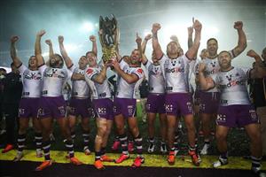 SYDNEY, AUSTRALIA - OCTOBER 25: Cameron Smith of the Storm holds aloft the Premiership trophy and celebrates with team mates after winning the 2020 NRL Grand Final match between the Penrith Panthers and the Melbourne Storm at ANZ Stadium on October 25, 2020 in Sydney, Australia. (Photo by Cameron Spencer/Getty Images)