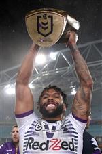 SYDNEY, AUSTRALIA - OCTOBER 25: Josh Addo-Carr of the Storm holds aloft the Premiership trophy after winning the 2020 NRL Grand Final match between the Penrith Panthers and the Melbourne Storm at ANZ Stadium on October 25, 2020 in Sydney, Australia. (Photo by Cameron Spencer/Getty Images)