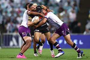SYDNEY, AUSTRALIA - OCTOBER 25: Josh Mansour of the Panthers is tackled during the 2020 NRL Grand Final match between the Penrith Panthers and the Melbourne Storm at ANZ Stadium on October 25, 2020 in Sydney, Australia. (Photo by Cameron Spencer/Getty Images)